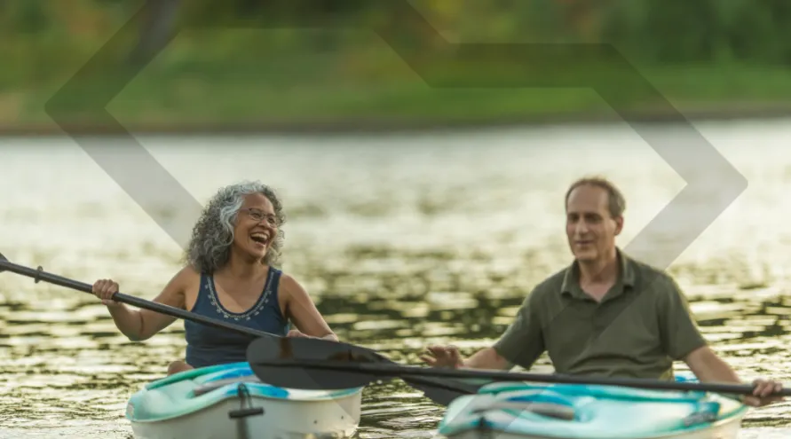 Two adults in kayaks