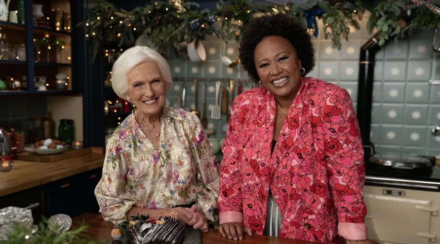 Mary Berry and Emeli Sandé standing in the kitchen